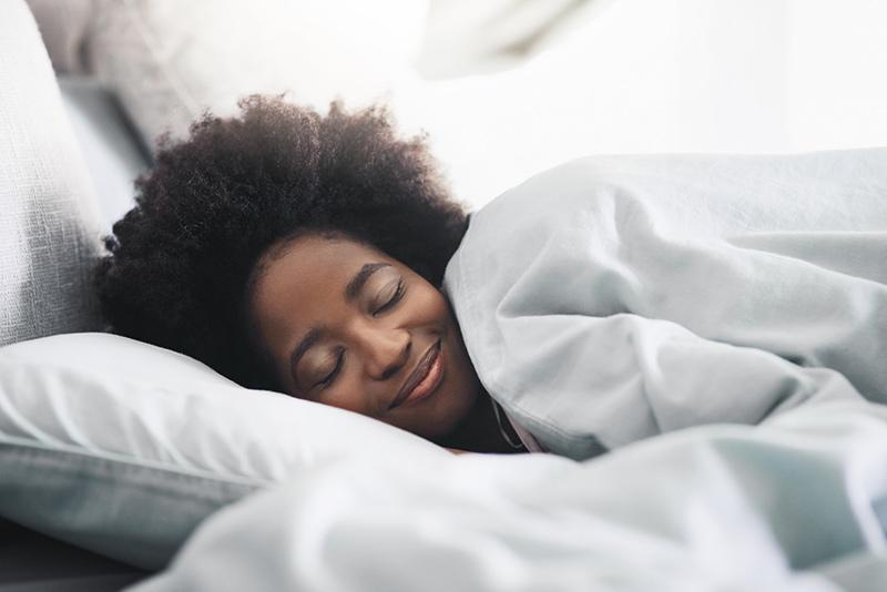 happy woman sleeping